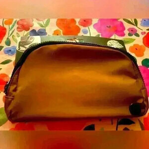 Unisex belt bag ,brand new,cognac with black interior.